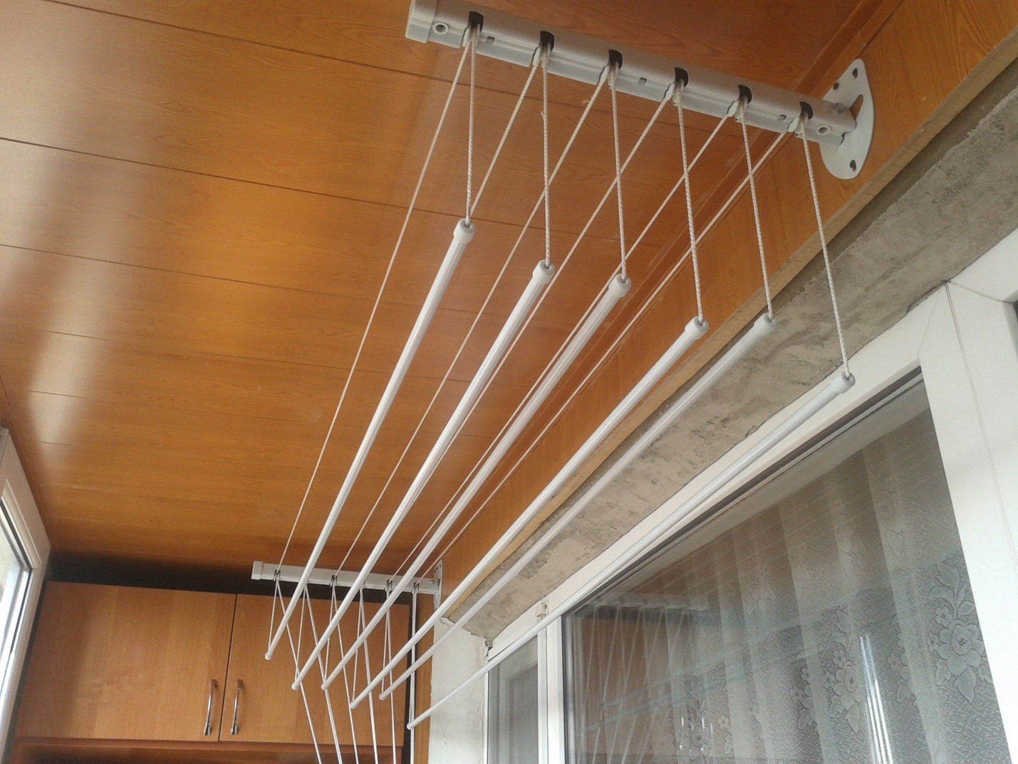 Балконная сушилка для белья «Лиана»: описание, виды и инструкция по установке своими руками
